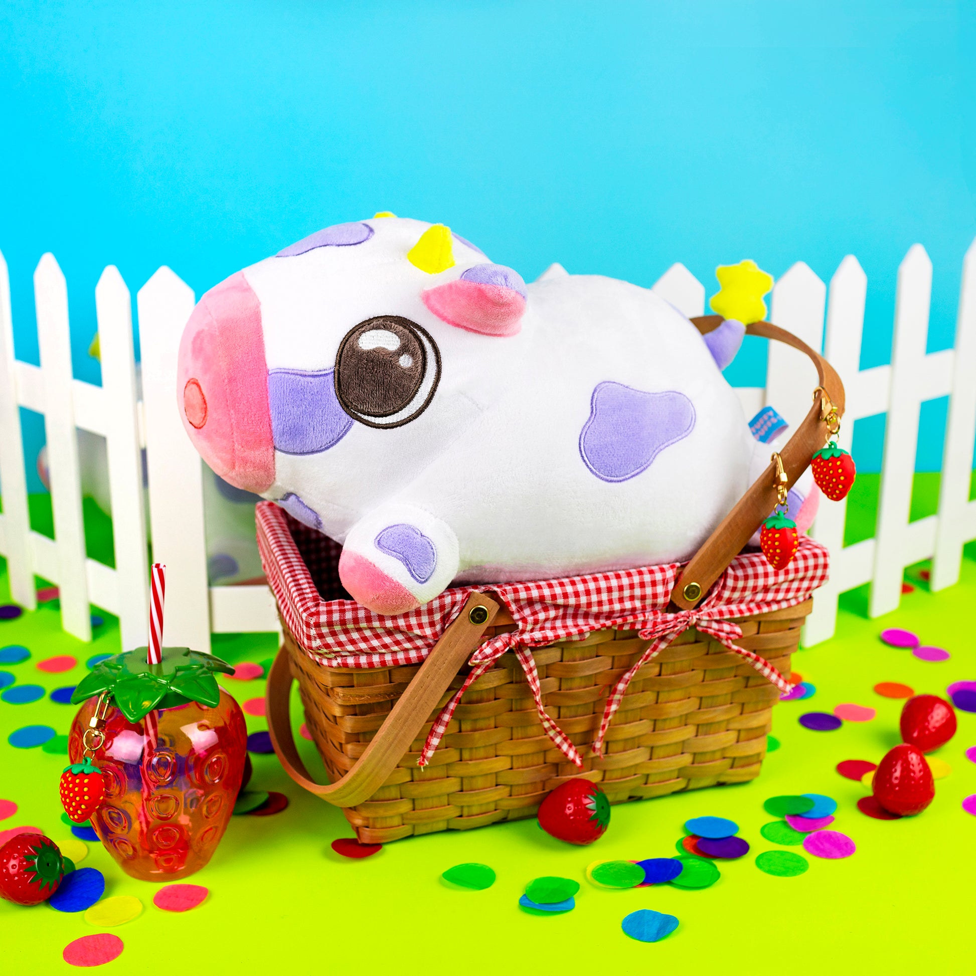 Kawaii plushie cow stuffed animal in a picnic basket