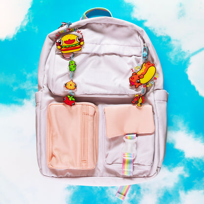 Hotdog keychain shown on backpack