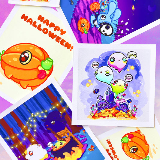 Cute prints of halloween kawaii art scattered in a pile