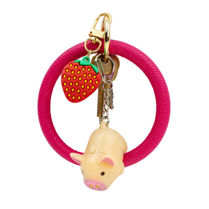 Piggy keychain with a set of keys