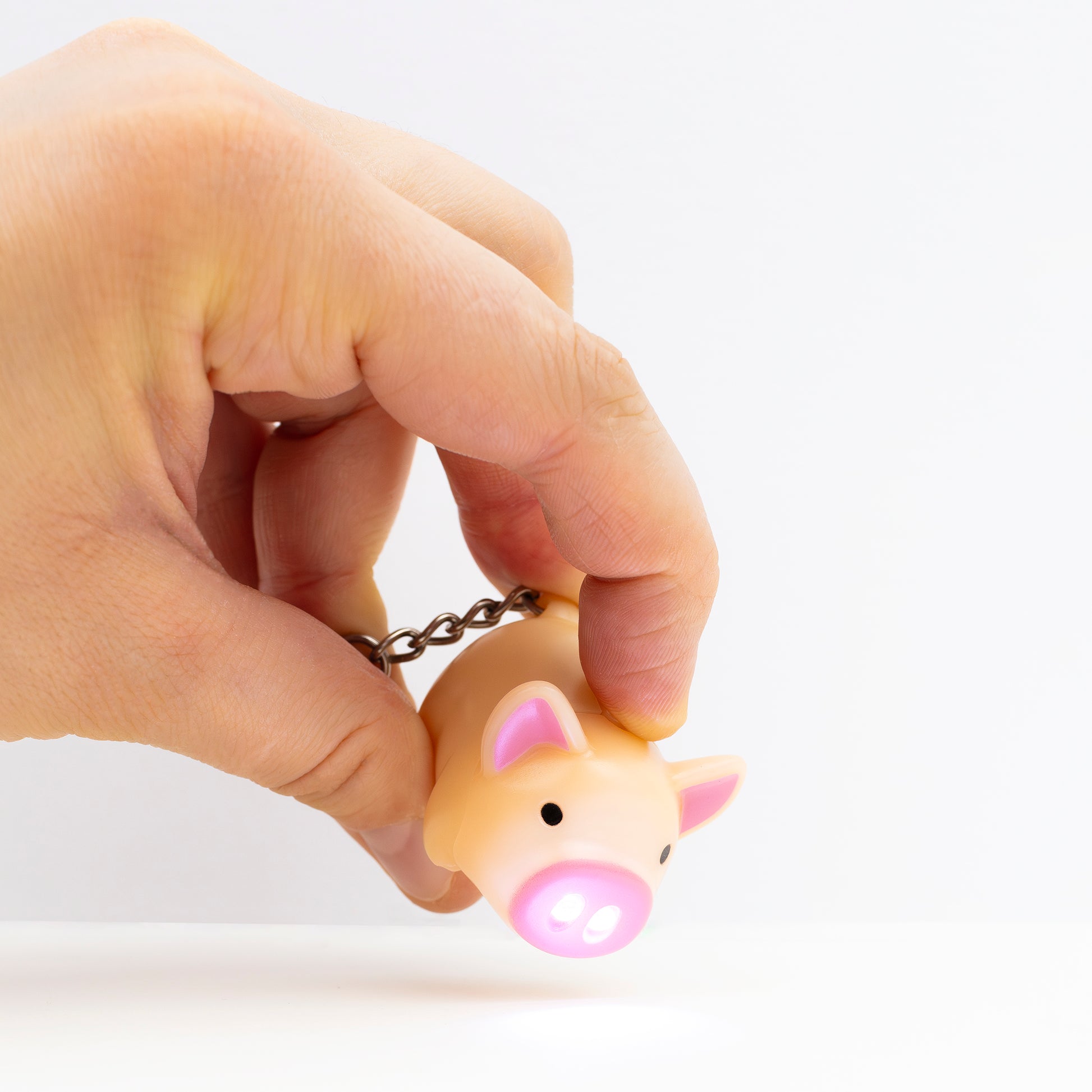 Piggy keychain with flash light on