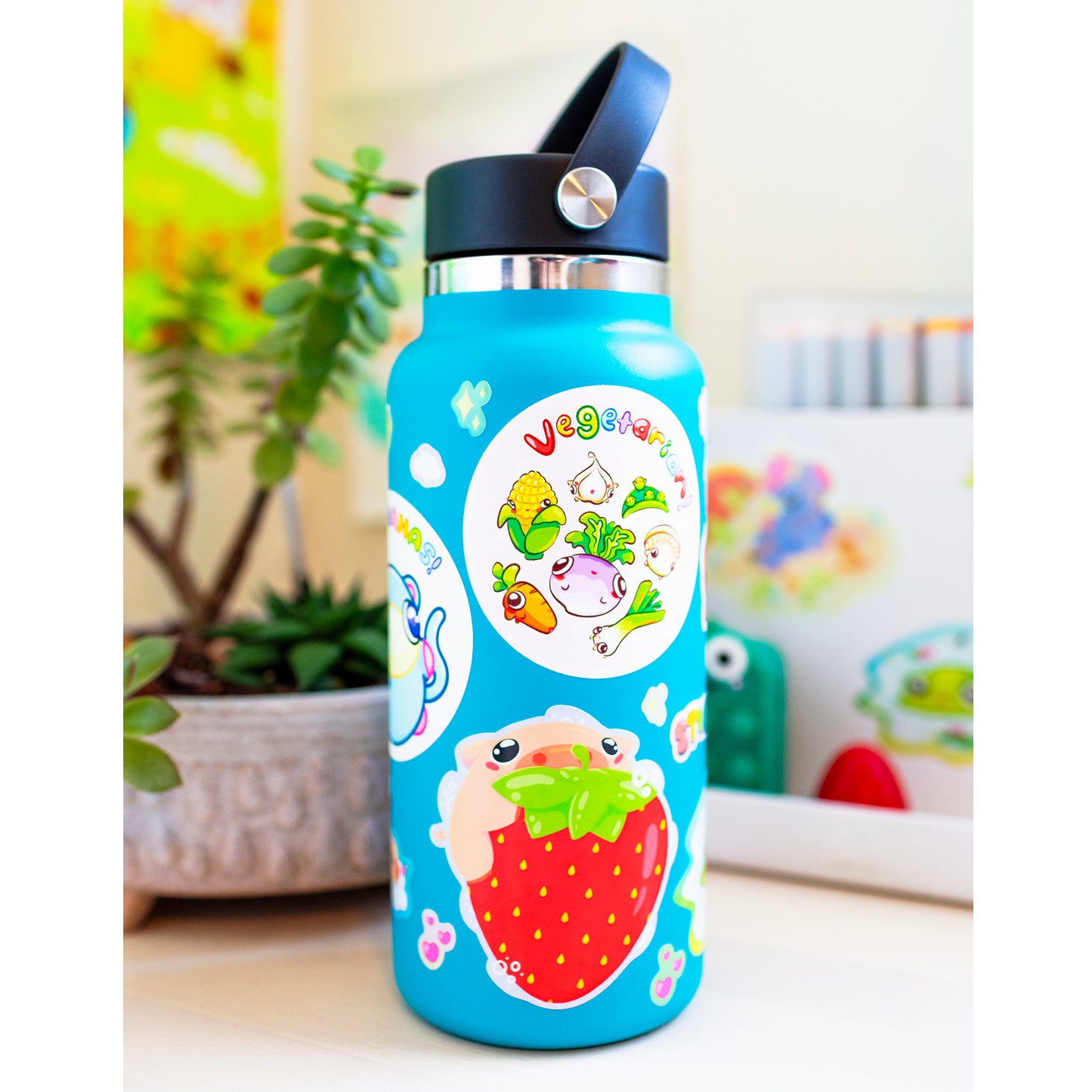 Strawberry sticker on water bottle